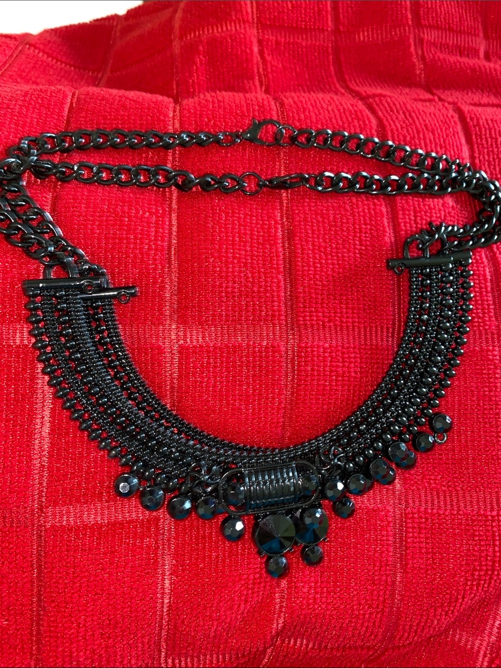 1 Necklace Metal with various sizes Black Rhinestones